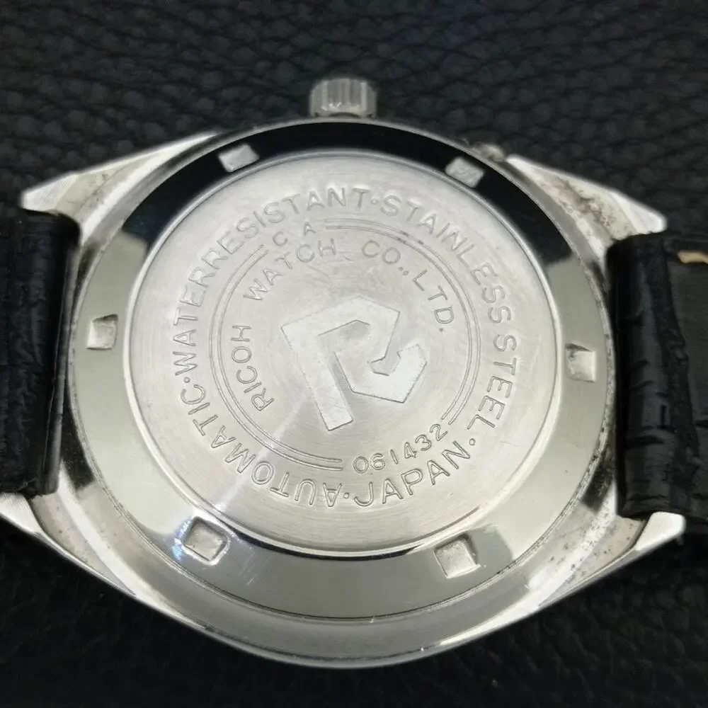 Vintage 1973 Ricoh Automatic Mens Silver Watch W/daydate & Black accents